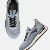 bugatti Sandar blue athleisure sneakers with black laces, suede and mesh upper, and a cushioned sole.