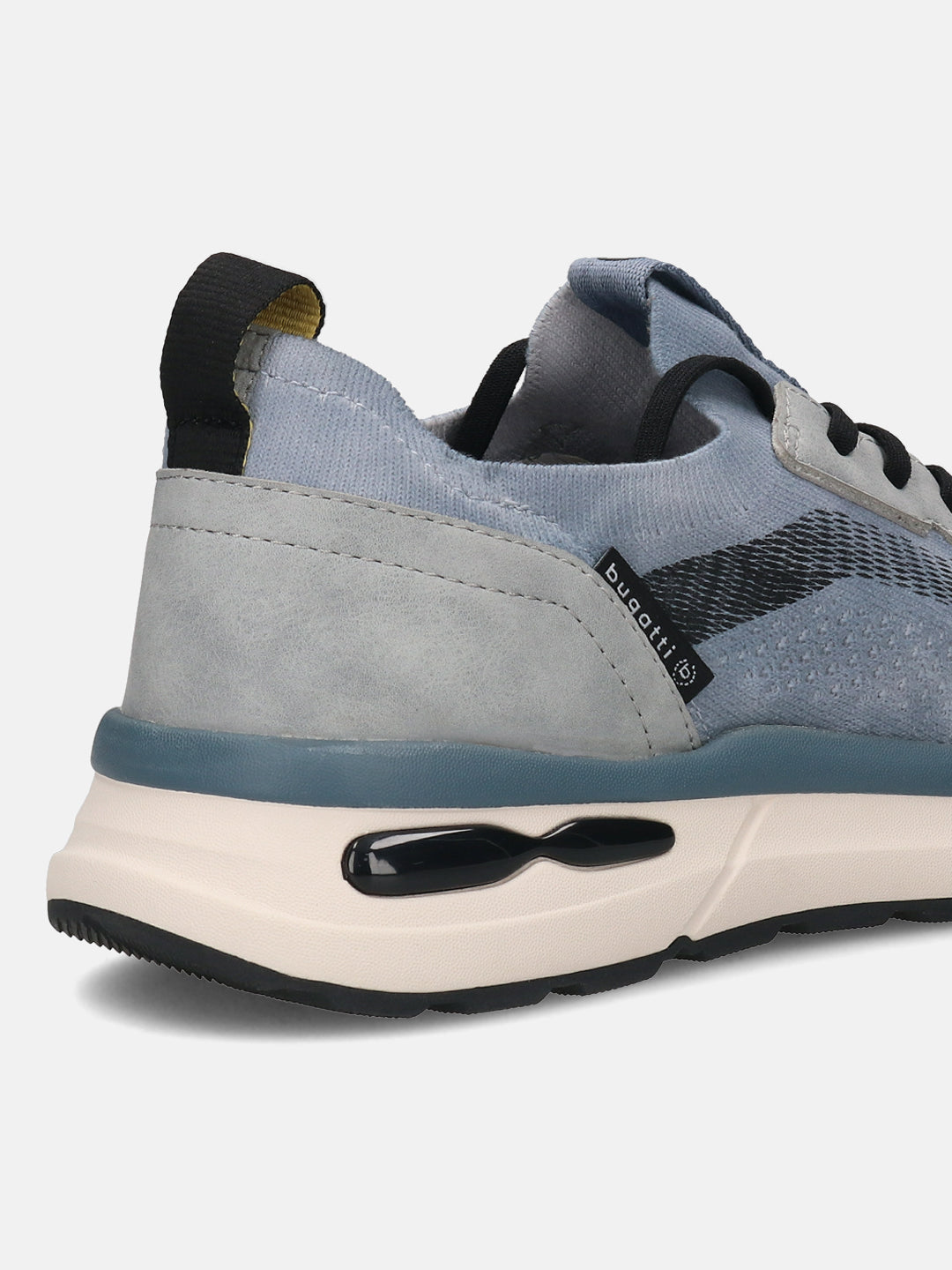 Cropped back view of a bugatti Sandar blue athleisure sneaker, with black pull tab, grey suede accents, and a thick cream and black sole.