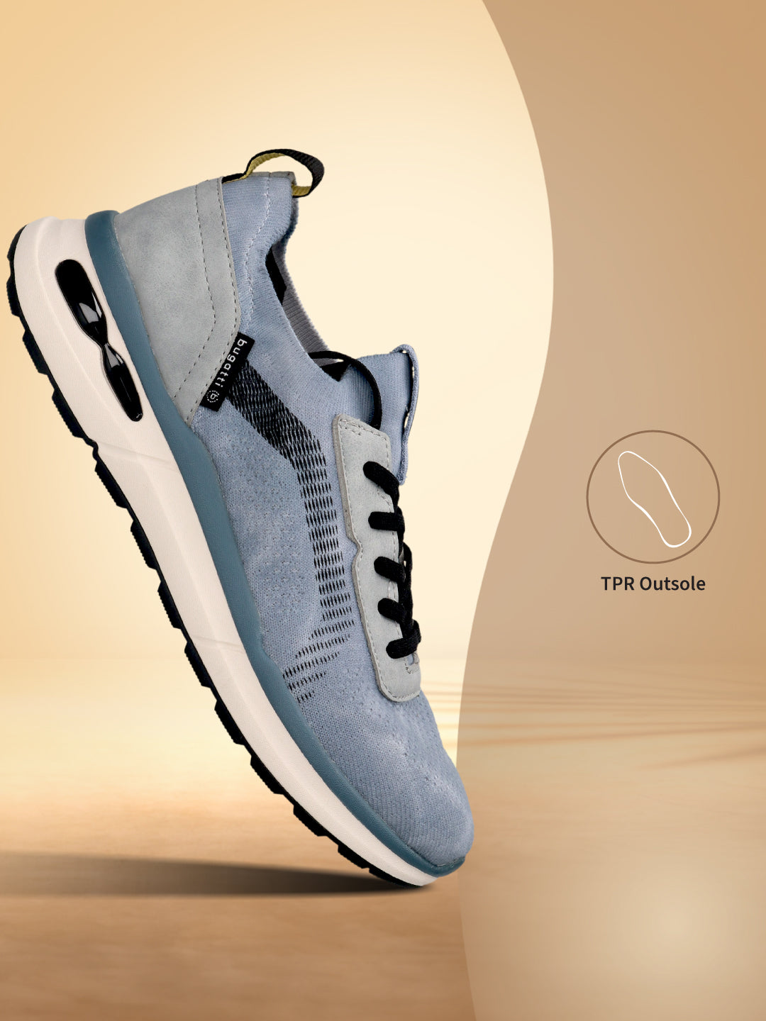Side view of a blue bugatti Sandar Athleisure sneaker with black laces, a white sole, and grey suede accents.
