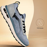 Side view of a blue bugatti Sandar Athleisure sneaker with black laces, a white sole, and grey suede accents.
