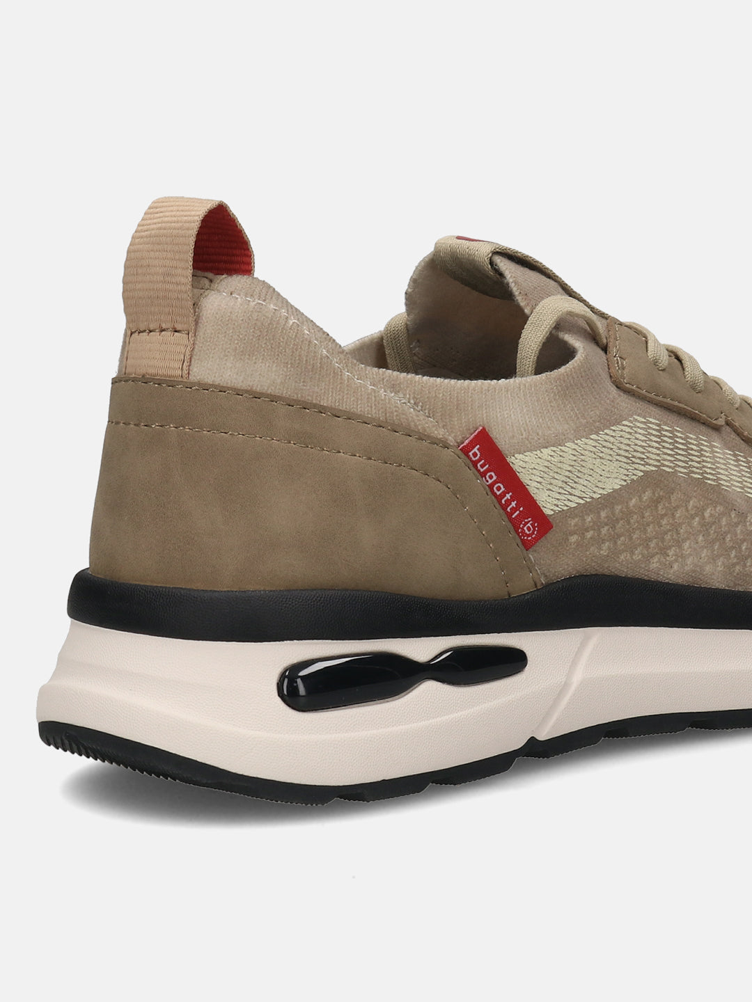 Cropped back view of a beige bugatti athleisure sneaker with a black and off-white sole.
