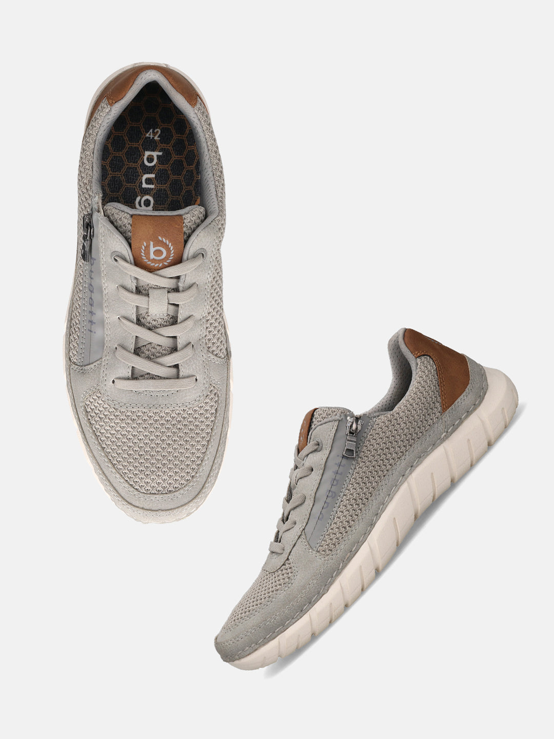 bugatti Compton grey comfort sneakers with a mesh texture, brown accents, laces, and a side zipper.
