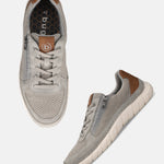 bugatti Compton grey comfort sneakers with a mesh texture, brown accents, laces, and a side zipper.
