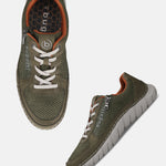 bugatti Compton comfort sneakers in green with orange trim and white laces.