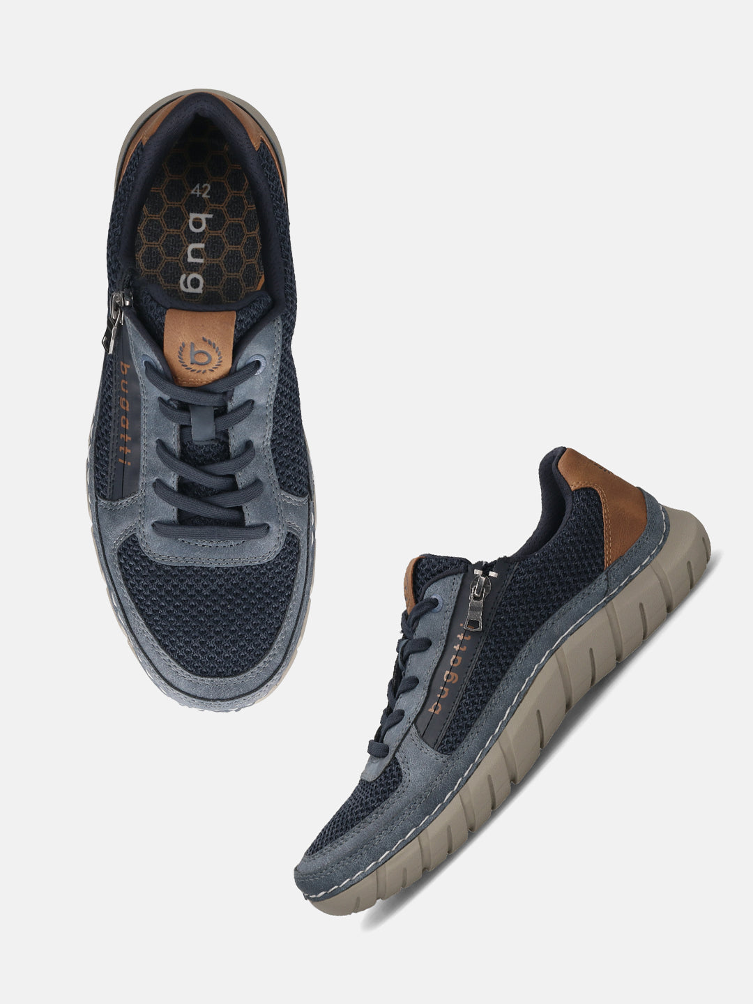 bugatti Compton comfort sneakers in dark blue, featuring laces, a side zipper, and a brown heel accent.
