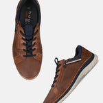 bugatti Rickson cognac Comfort Sneakers with navy blue accents, lace-up style, and side zipper.

