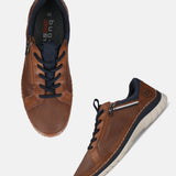 bugatti Rickson cognac Comfort Sneakers with navy blue accents, lace-up style, and side zipper.
