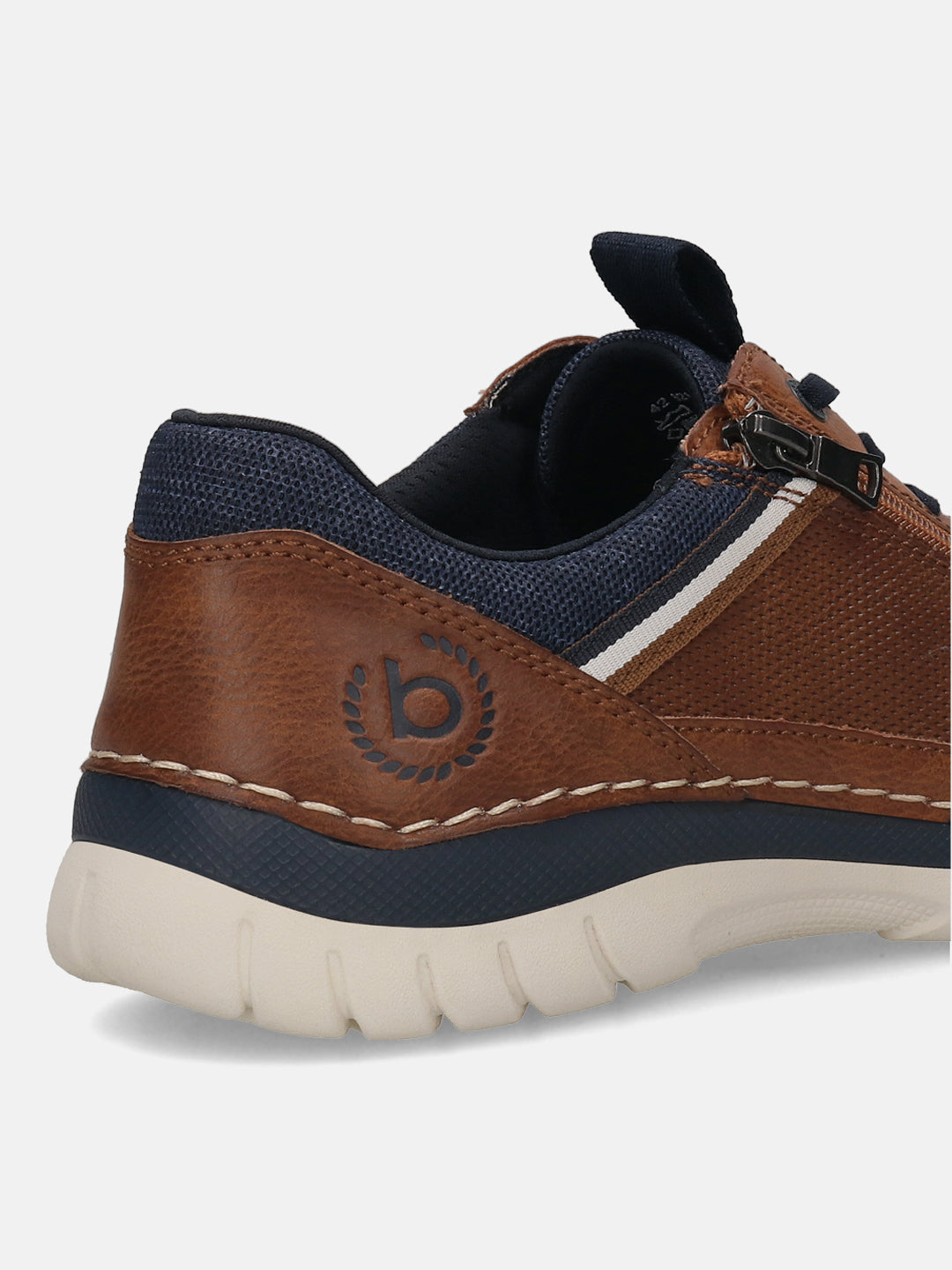 Cropped view of a bugatti Rickson cognac Comfort Sneaker, showing a brown leather heel with blue trim and a cream-colored sole.
