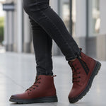 Cropped lifestyle shot of bugatti Drake Bordo boots, featuring red premium leather, lace-up closure, and a comfortable, casual style.
