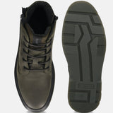 Bugatti Drake dark green leather casual boots, top-down view showing laces and patterned sole.
