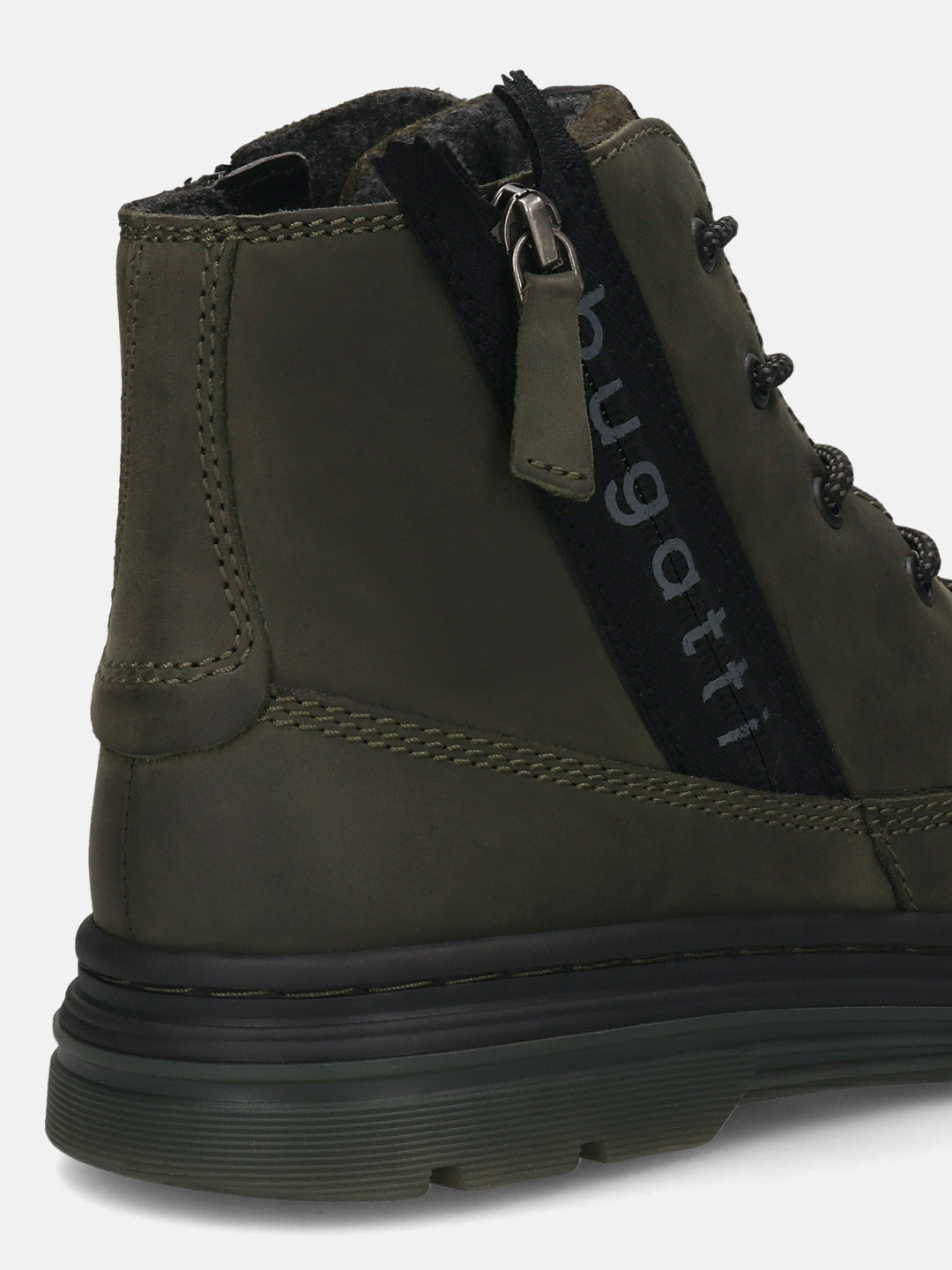 Cropped view of a Bugatti Drake boot in dark green premium leather, showing the side zipper and lug sole.
