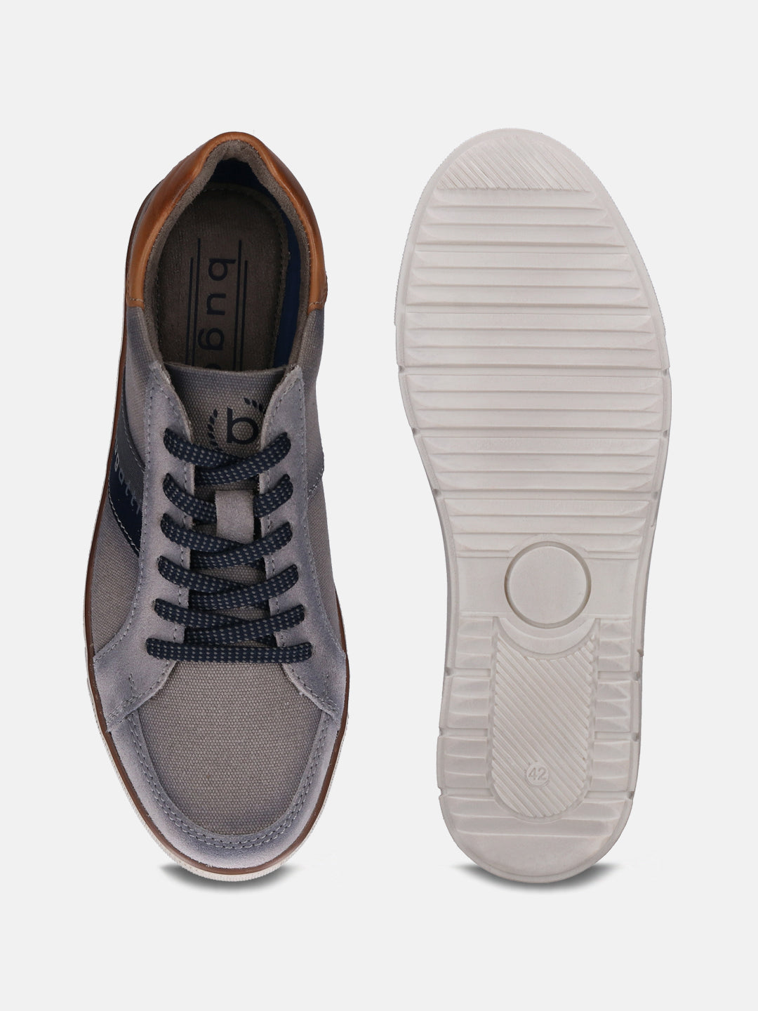 Grey low top sneakers by bugatti featuring navy laces and striped accent, next to the shoe's textured white sole.