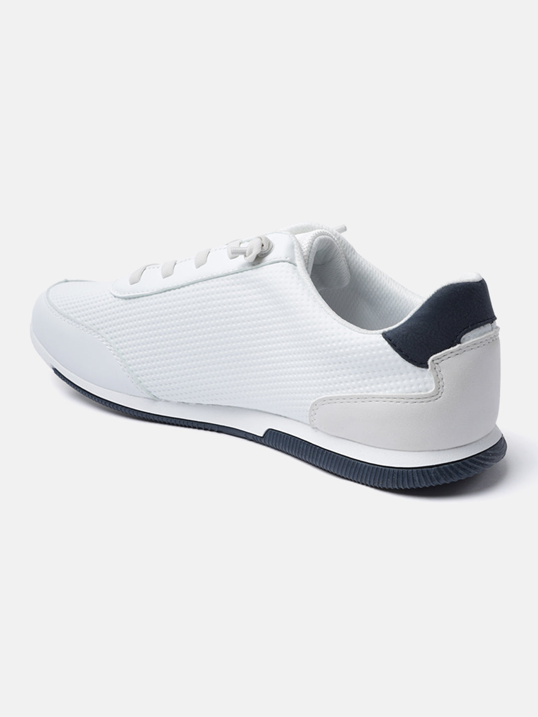 White comfort sneaker by Bugatti featuring a sporty design, textured upper, and dark blue accents.