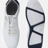 White sneakers by bugatti, displaying white laces and the brand logo on the insole.