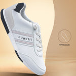 Side view of a white bugatti sneaker with a textured upper, striped accent, and dark navy heel detail.
