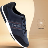 Side view of a navy bugatti sneaker with black accents and a white sole.