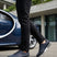 Lifestyle shot of bugatti "Report ECO" dark blue sneakers, with a textured upper, black accents, and a white sole.
