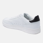 White comfort sneakers by bugatti with black heel, shown in a side view.