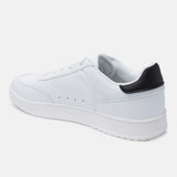 White comfort sneakers by bugatti with black heel, shown in a side view.