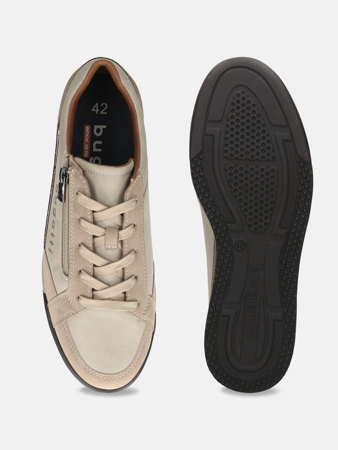 Beige bugatti Trevor comfort sneakers with laces and zipper, shown next to the shoe sole.