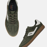 bugatti Carmelo dark green comfort sneakers with white accents and a brown sole.