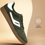 Side view of a dark green bugatti Carmelo Comfort Sneakers with white accents and brown soles.
