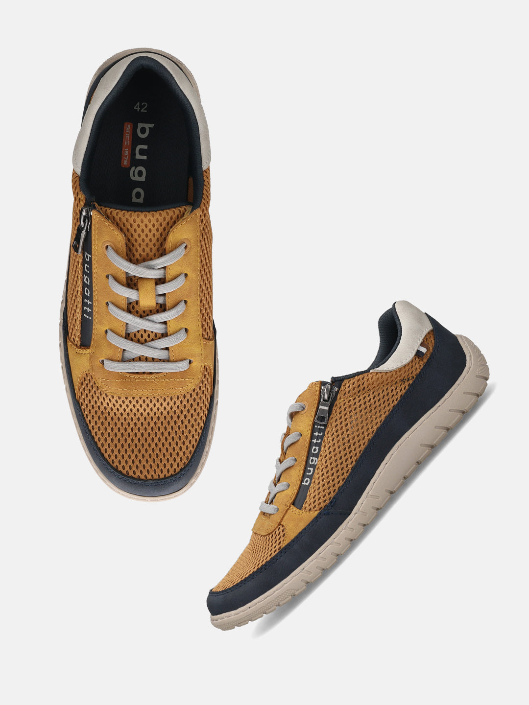 Pair of bugatti Bermudas yellow comfort sneakers; golden brown mesh with gray laces and navy accents.
