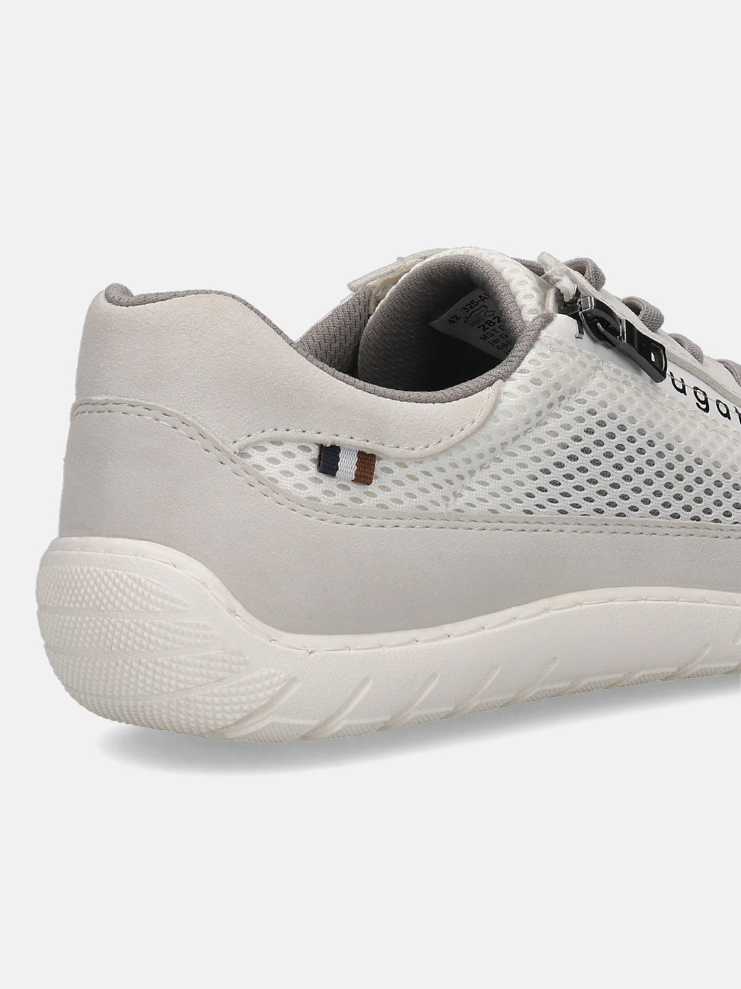 Close-up of a white bugatti sneaker showing mesh, textile, and suede-like material.