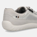Close-up of a white bugatti sneaker showing mesh, textile, and suede-like material.