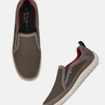 Bugatti Bermudas dark gray slip-on casual shoes, featuring a mesh upper, a low-profile silhouette, and a contrasting sole.
