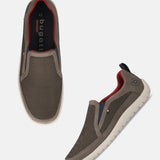 Bugatti Bermudas dark gray slip-on casual shoes, featuring a mesh upper, a low-profile silhouette, and a contrasting sole.
