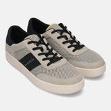 bugatti Mackay light grey sneakers featuring a mesh design, black accents, and a comfortable rubber sole.
