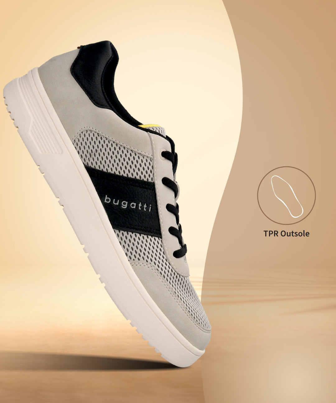 A bugatti Mackay light gray sneaker with a white sole and black accents, shown at a slight angle.
