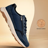 Side view of a dark blue bugatti sneaker with a white midsole and a brown rubber outsole.