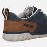 Cropped view of a dark blue bugatti Comfort Sneaker with brown leather heel detail and a ridged sole.
