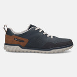 Side view of a bugatti Samana comfort sneaker in dark blue leather with brown accent and light sole.
