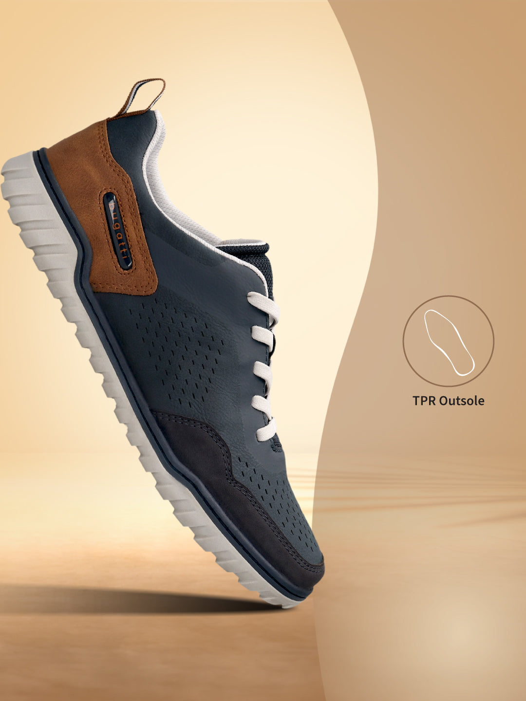 Bugatti Samana dark blue comfort sneaker with white laces, brown and blue leather, and a ridged white sole.
