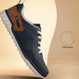 Bugatti Samana dark blue comfort sneaker with white laces, brown and blue leather, and a ridged white sole.
