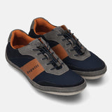Grey premium leather comfort sneakers by bugatti, with navy and brown accents, and elastic laces.