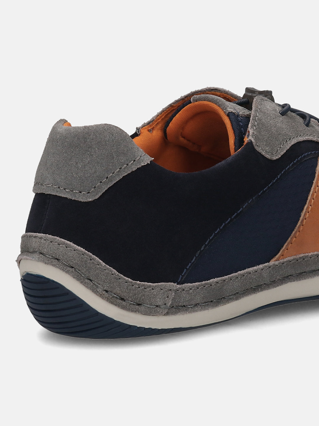 Grey leather comfort sneaker by bugatti, showing a stitched trim and navy textile panels.