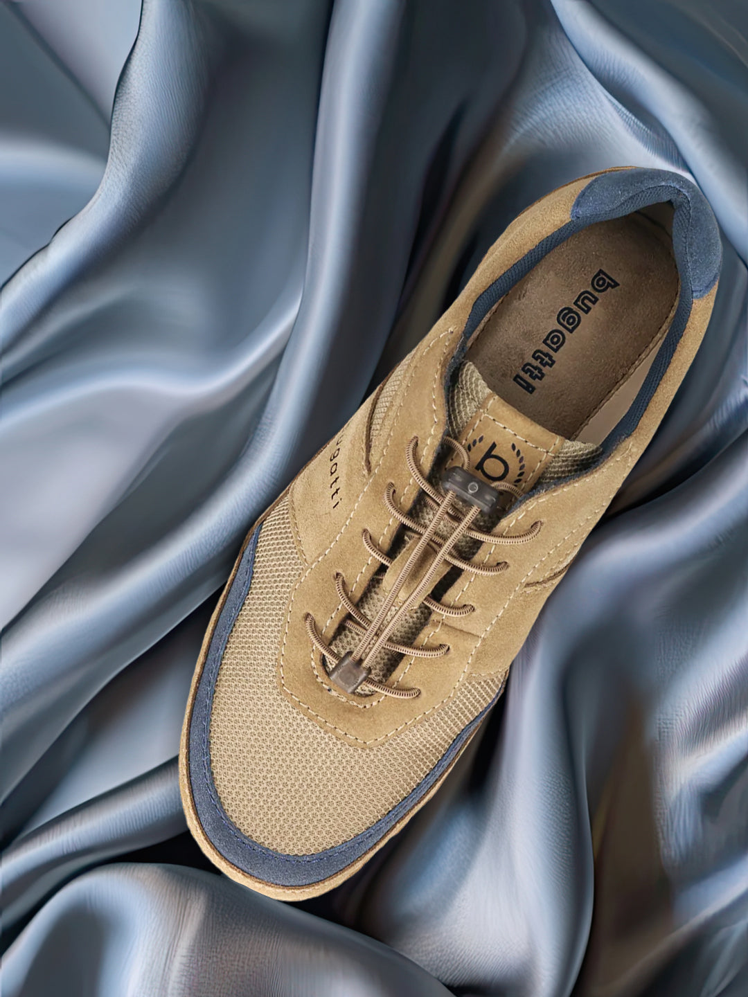 A brown Men's bugatti Sneakers featuring a round toe plain toe, zero heels heel. Made from premium genuine leather with a durable sebs (block copolymer) outsole, this elastic design offers both style and comfort.