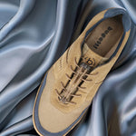 A brown Men's bugatti Sneakers featuring a round toe plain toe, zero heels heel. Made from premium genuine leather with a durable sebs (block copolymer) outsole, this elastic design offers both style and comfort.