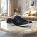 A blue Men's bugatti Mules featuring a round toe plain toe, zero heels heel. Made from premium genuine leather with a durable sebs (block copolymer) outsole, this slip-on design offers both style and comfort.