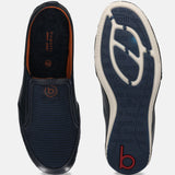 A blue Men's bugatti Mules featuring a round toe plain toe, zero heels heel. Made from premium genuine leather with a durable sebs (block copolymer) outsole, this slip-on design offers both style and comfort.