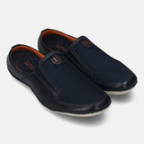 A blue Men's bugatti Mules featuring a round toe plain toe, zero heels heel. Made from premium genuine leather with a durable sebs (block copolymer) outsole, this slip-on design offers both style and comfort.