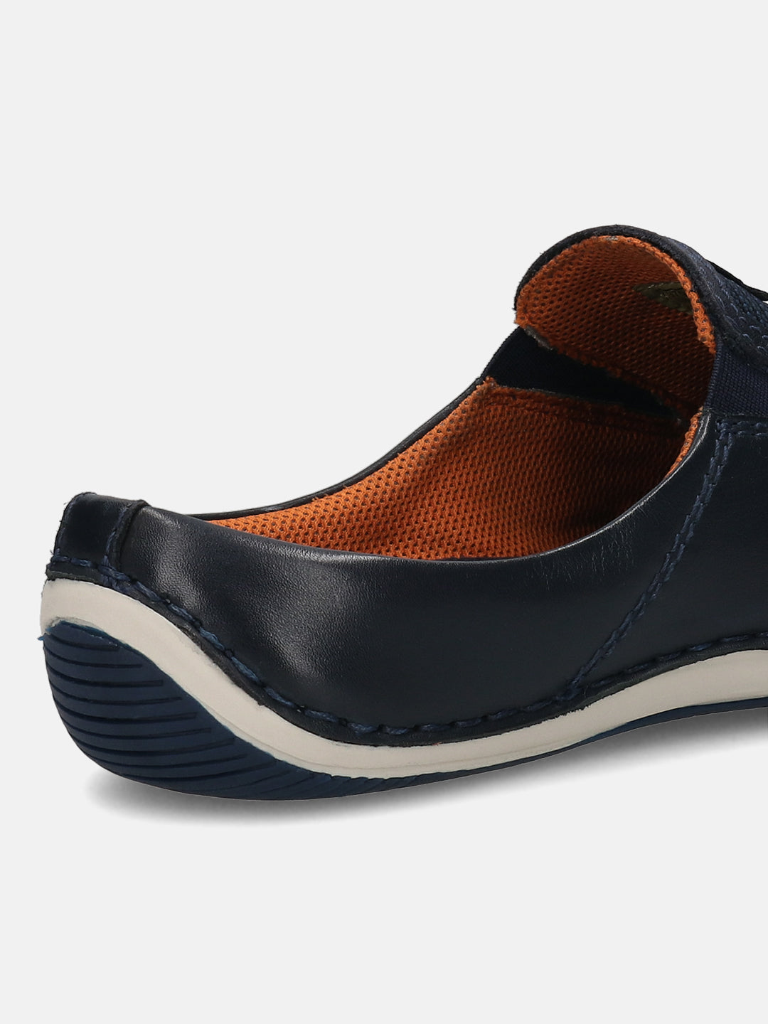 A blue Men's bugatti Mules featuring a round toe plain toe, zero heels heel. Made from premium genuine leather with a durable sebs (block copolymer) outsole, this slip-on design offers both style and comfort.