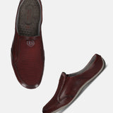 A grey Men's bugatti Mules featuring a round toe plain toe, zero heels heel. Made from premium genuine leather with a durable sebs (block copolymer) outsole, this slip-on design offers both style and comfort.