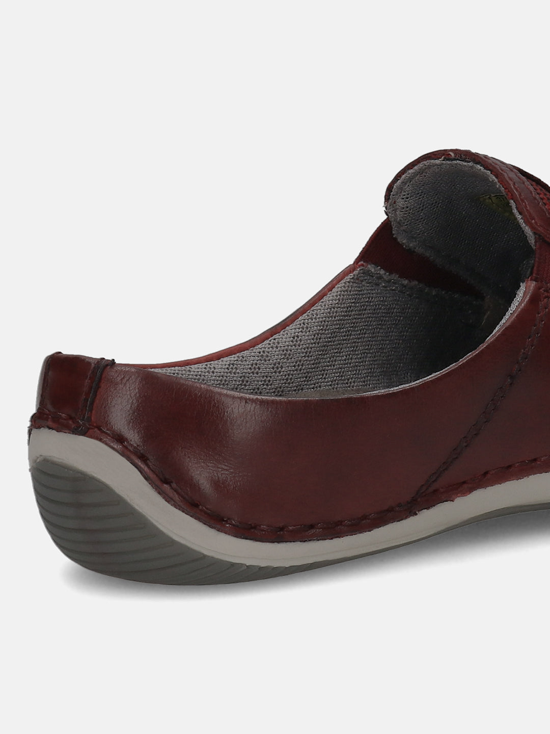 A grey Men's bugatti Mules featuring a round toe plain toe, zero heels heel. Made from premium genuine leather with a durable sebs (block copolymer) outsole, this slip-on design offers both style and comfort.
