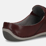 A grey Men's bugatti Mules featuring a round toe plain toe, zero heels heel. Made from premium genuine leather with a durable sebs (block copolymer) outsole, this slip-on design offers both style and comfort.