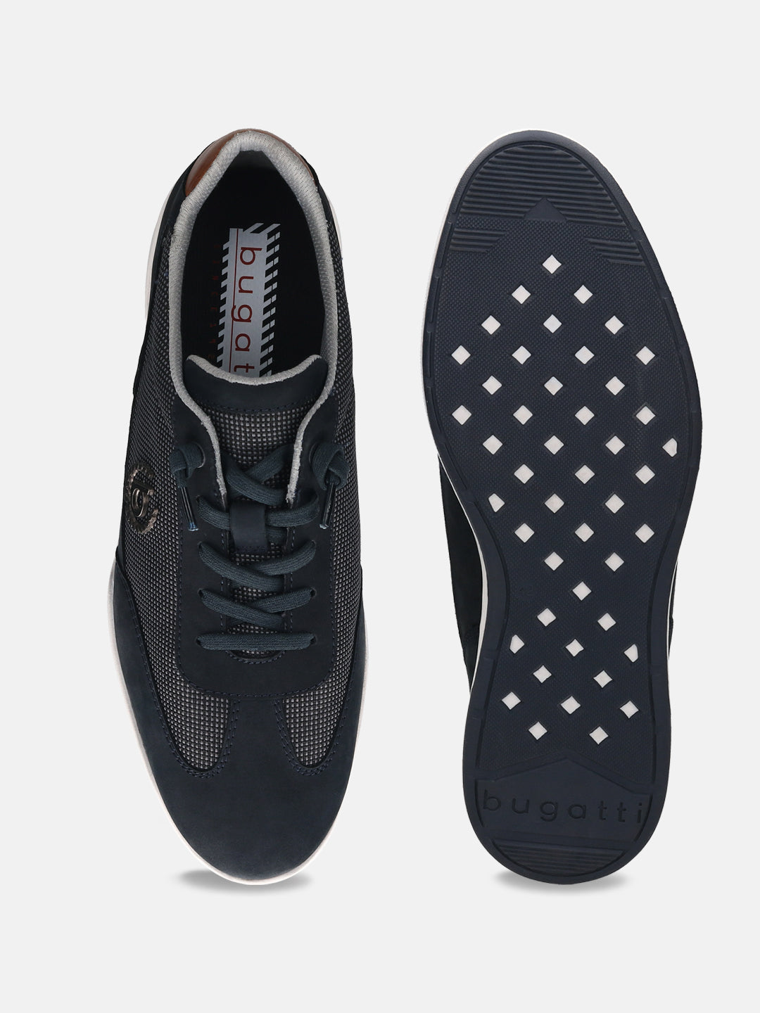 Dark blue leather sneakers by Bugatti, showing the sole and interior, with a textured pattern on the uppers.